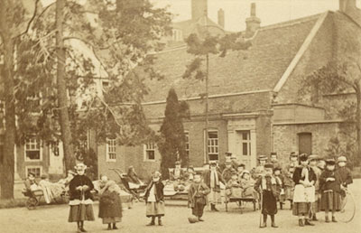 ‘Playing in the Gardens c1900’